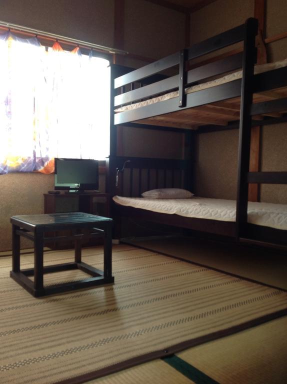 Buddha Guest House Shirahama Onsen Стая снимка